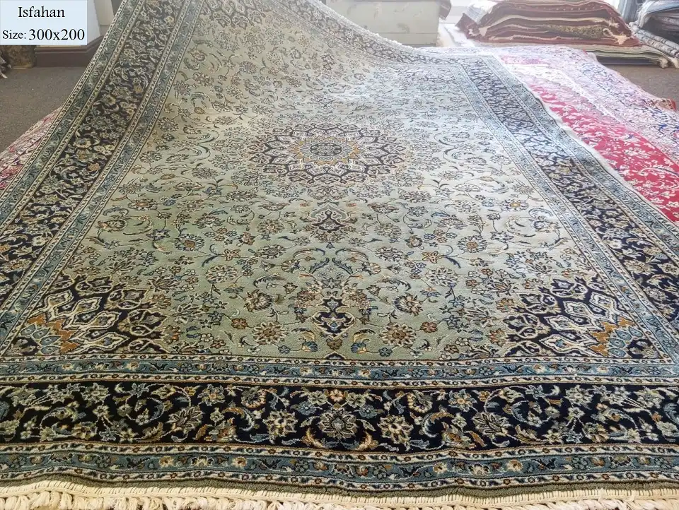 Hand Tufted Isfahan rug, size: 300x200 cm, rich pistachio color, mixture of wool & cotton, Valuation Certificate of R15000 and exchange warranty. Imported directly from Iran. 