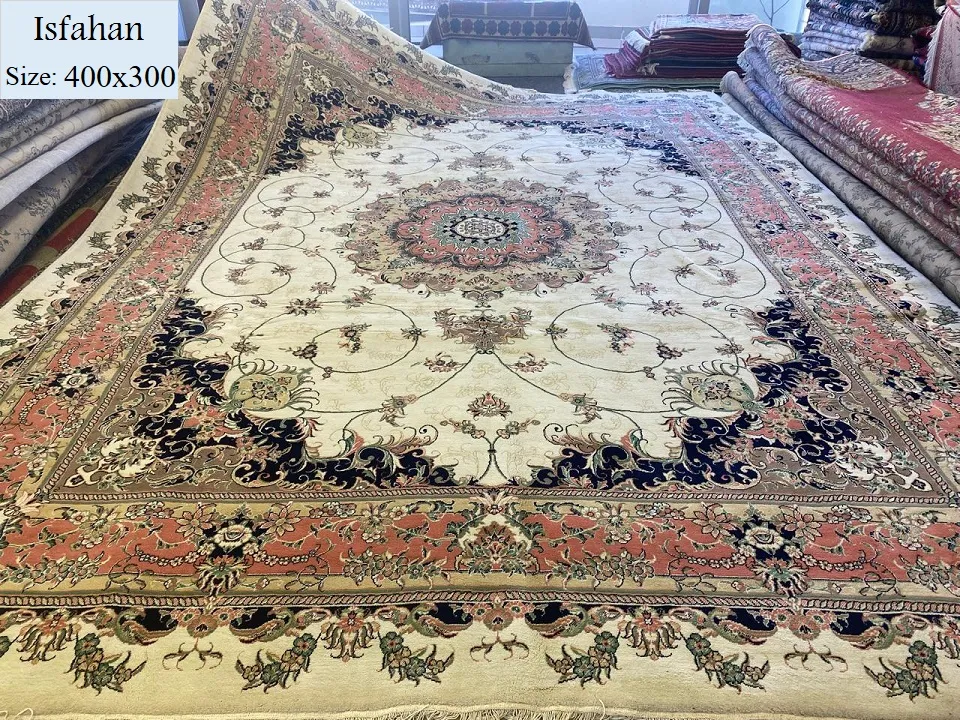 Isfahan second hand carpet, Size: 400x300 cm, wool on cotton, 400 knots per square meters, R9500 valuation certificate and exchange warranty.