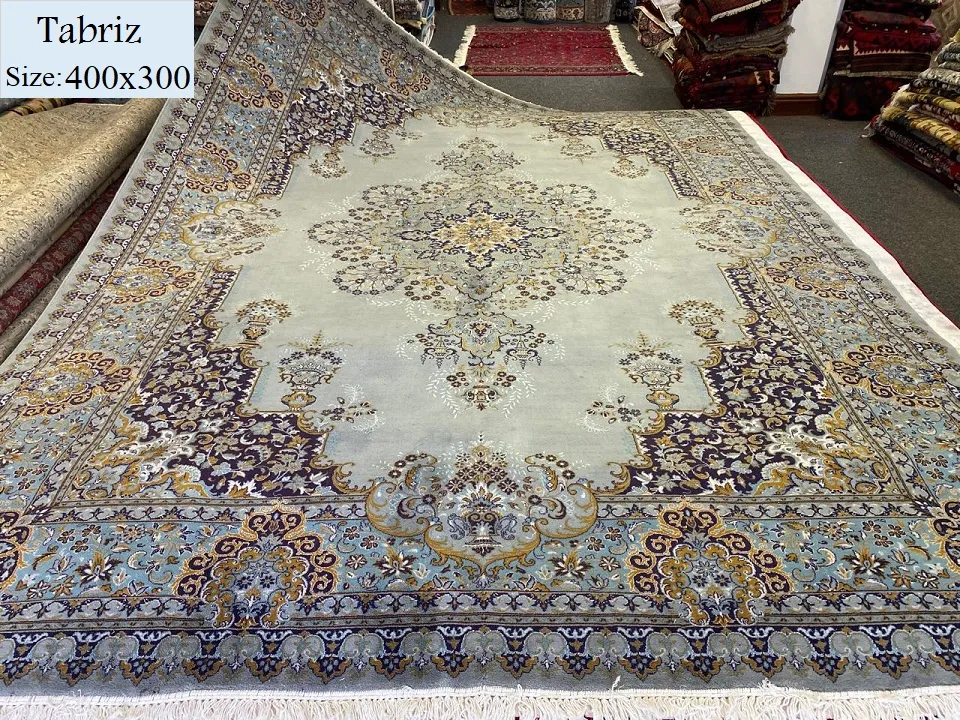 Pre loved Tabriz carpet, Size: 400×300 cm, light grey, wool on cotton, 400 knots per square meters, R8000 valuation certificate and exchange warranty.